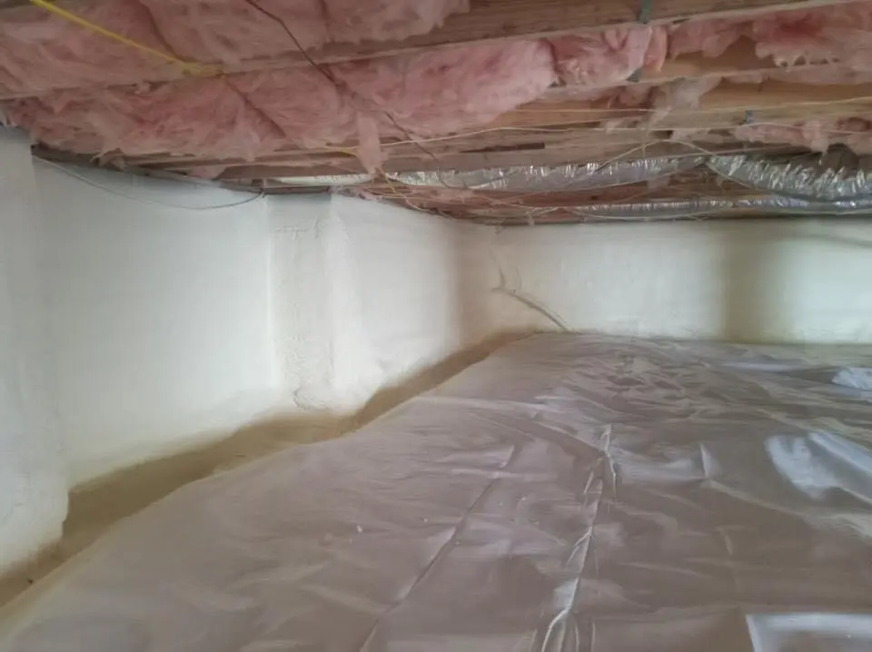 Crawl space encapsulation with closed-cell spray foam for Commercial Roof Restoration in Georges